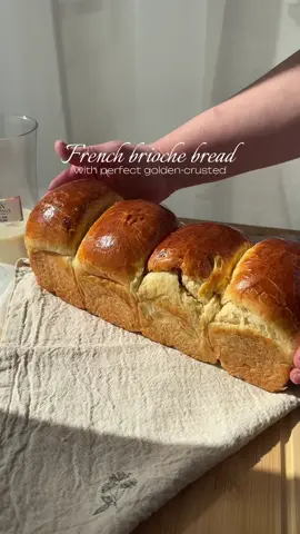 BRIOCHE BREAD -ultra soft, rich, buttery with perfect golden-crusted. ingredients:- 375 grams (50gm+325 gm) Flour 75 grams(25gm+50gm) Sugar 5 grams instant dry Yeast  100 ml milk ½ tsp salt  3 eggs, almost 150 grams  120 grams Butter 1.Prepare the Yeast Mixture: Mix 100 ml milk, 25 g sugar, 5 g yeast, and 4 tbsp flour. Let sit for 30 minutes. 2.Dry Ingredients: In a bowl, combine remaining flour, 50 g sugar, and ½ tsp salt. 3.Eggs: Whisk 3 eggs. 4.Mix the Dough: Add the yeast mixture, dry ingredients, and eggs to a mixer. Knead for 7–8 minutes. 5.Add Butter: Gradually mix in 120 g soft butter. Knead for another 10–15 minutes until smooth. 6.First Rise: Let the dough rest in a warm place for 1 hour until doubled. 7.Shape: Divide into 6 pieces, roll into balls, and proof for 45–60 minutes. Bake at 170°C (340°F) for 30–35 minutes. #brioche #briochebread #bread #breadmaking #EasyRecipe #briochebun 