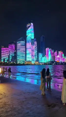 Welcome to Qingdao 🇨🇳  Where Enchanting Beaches Meet the Magic of Romantic Lights 🌆 #Qingdao #RomanticEscape #SummerVibes #BeachLife #MagicalLights #TravelChina #China #Fyp 