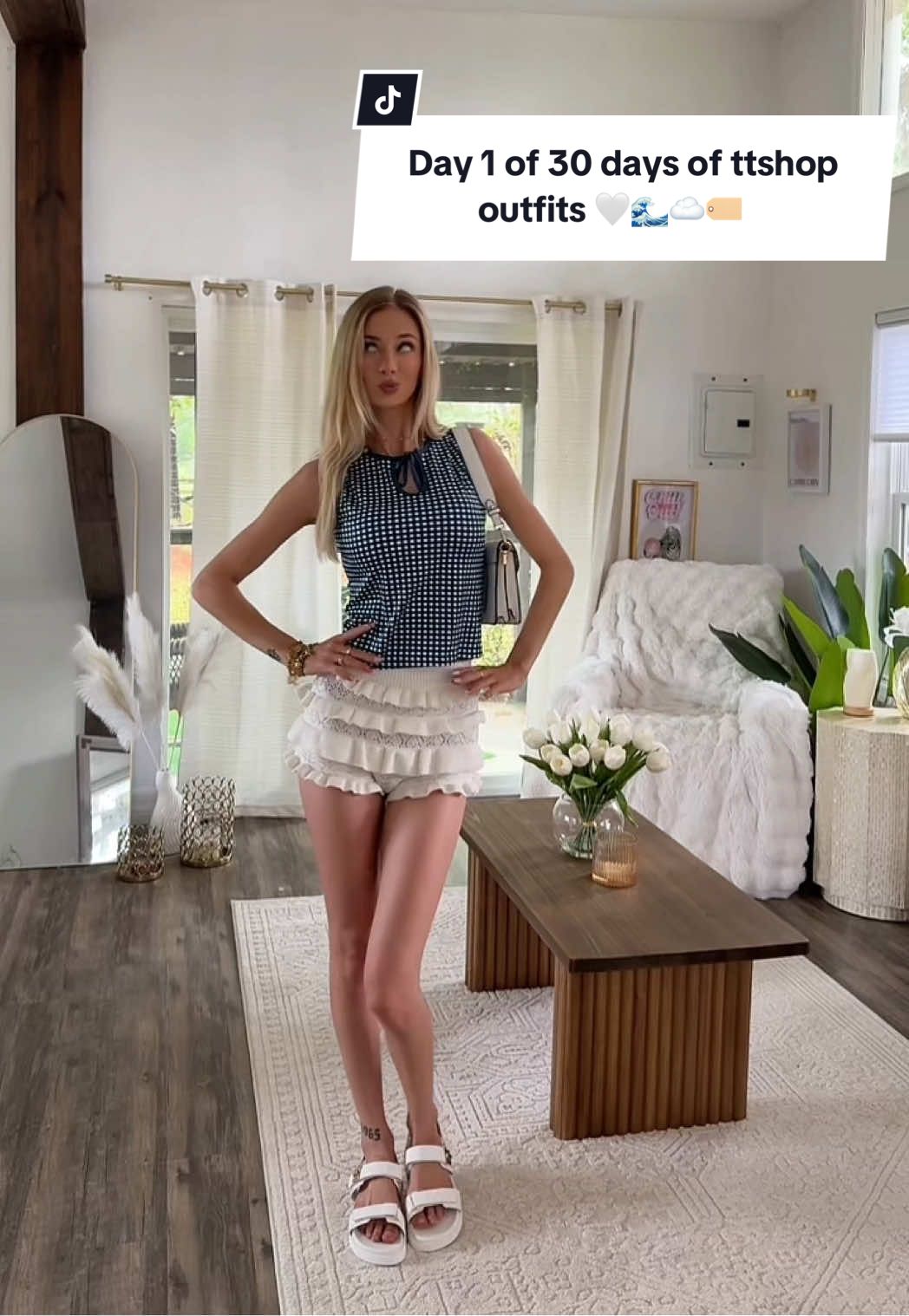 Starting off my 30 Days of TikTok Shop Outfits with this super cute and decently affordable summer combo! 🌸 Plaid tie top, ruffle knit shorts, and comfy sandals – perfect for any casual summer event. Everything is linked 💫🛍️ #summeroutfit #outfitinspo #outfitideas #outfitstyling #styleinspo #summerwardrobe #ootdinspo #ootdfashion #tiktokshopfinds #springoutfit #shopthelook #summeressentials #casualoutfits #casualoutfitideas #fashiononabudget #affordablefashion 