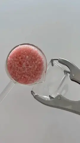 Stress Ball with the Small Pink Beads.  #asmr #asmrsound #handmade #stressball #squishy #decompression #satisfying #beads 