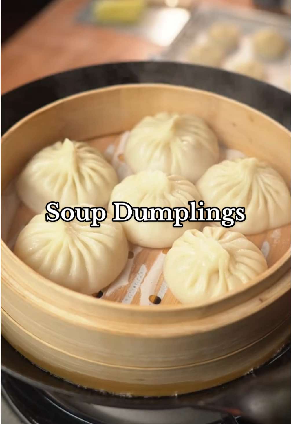 Soup Dumplings Ingredients Aspic: * 2 lbs pork hock * 3 green onions (quartered) * 3-inch knob ginger (sliced) * 2 bay leaves * 1/2 cup Shaoxing wine * 8 cups water * Salt to taste Filling: * 1 lb ground pork * 3 green onions (minced) * 1 tbsp ginger (minced) * 1.5 tbsp soy sauce * 2 tbsp Shaoxing wine * 1/2 tsp sesame oil * 1/2 tsp salt * 1 tsp sugar * 1/4 tsp white pepper * 2 cups aspic (prepared earlier) Dough: * 450 grams dumpling flour * 1/2 tsp salt * 1 cup hot water Instructions Aspic: 1. Submerge pork hock in cold water and refrigerate for at least 4 hours or overnight. 2. Drain, then place pork in a pot with fresh cold water and blanch for 20 minutes. 3. Rinse thoroughly and return to the pot with ginger, green onions, bay leaves, Shaoxing wine, and water. 4. Simmer on medium-low heat for 4 hours. 5. Strain the broth into a sheet tray, cover, and refrigerate overnight until solidified. 6. Scrape off the fat from the top and finely chop the aspic. Filling: 1. In a bowl, combine all ingredients except the aspic. Mix in one direction until the mixture develops visible streaks of fat. 2. Gently fold in the aspic until well incorporated. Dough & Folding: 1. In a bowl, combine flour and salt. Slowly add hot water while mixing until a shaggy dough forms. 2. Knead until smooth, then cover and rest for 45 minutes. 3. Divide the dough in half and roll each half into a rope. 4. Cut into 8-10 gram pieces and roll each piece into a ball. 5. Flatten each ball and roll into a thin disk. 6. Place a tablespoon of filling in the center of each wrapper. Using your thumbs and index fingers, pleat the edges to form a sealed dumpling (aim for 18 pleats if possible). 7. Steam for 8 minutes and enjoy with soy sauce, black vinegar, chili oil, and ginger. #soupdumplings #xiaolongbao #dintaifung #Recipe #cooking #food #recipevideo #cookingvideo #soup #dumplings #dumpling 