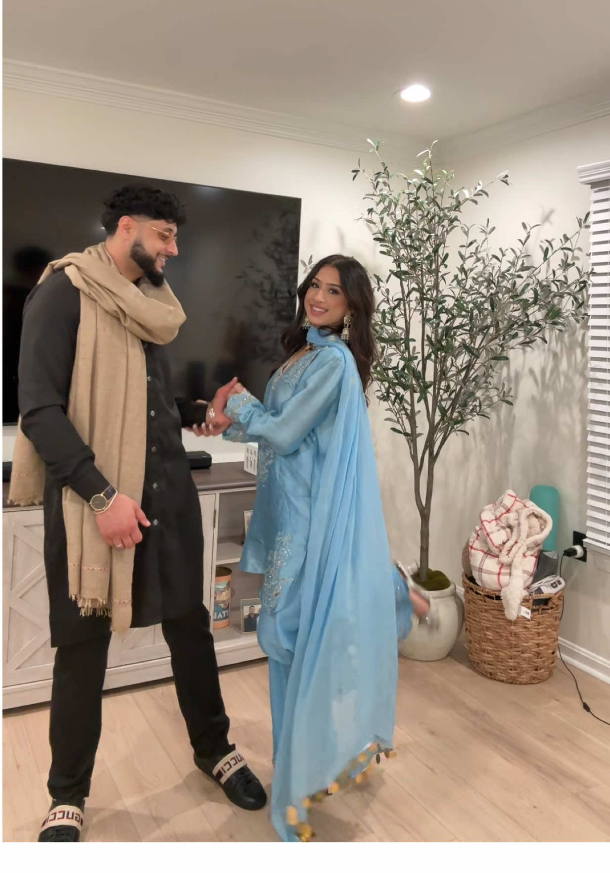He was in such a rush to twirl me HAHAH 🥹🩵 our Eid ootdddd  #fyp #foryou #foryoupage #eid #eidmubarak #eidalfitr #eid2025 #eidoutfit #couple #browncouple #pakistani #pakistanitiktok #pakistanifashion #farshishalwar 