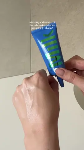 Swatching and unboxing of the NEW milk makeup hydro grip gel tint in shade 01 💧 @milkmakeup If you are a longtime fan of the hydro grip primer as I am you’ll love this! The tint is buildsble and comes in 15 flexible shades. For reference I am a cool-neutral undertone on fair skin. I love the hydration and the fact that this product is non comedogenic 🤍 (gifted) @Community X SEEN #milkmakeup #unboxing #swatch #skintint #hydrogrip #liveyourlook 