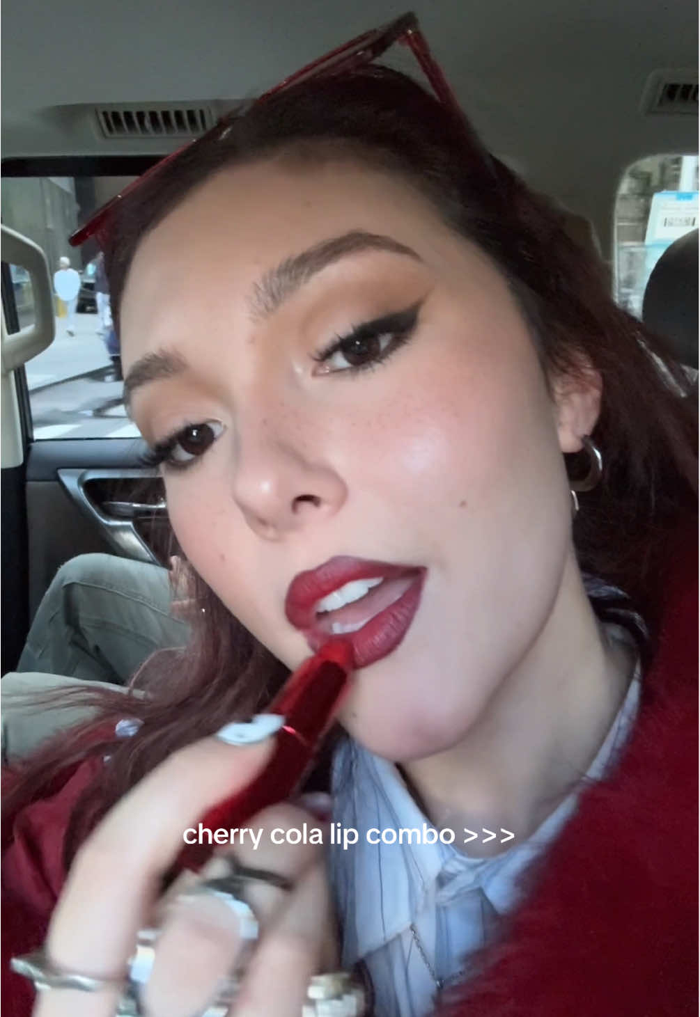gotta touch up the lip combo in every uber 🍒