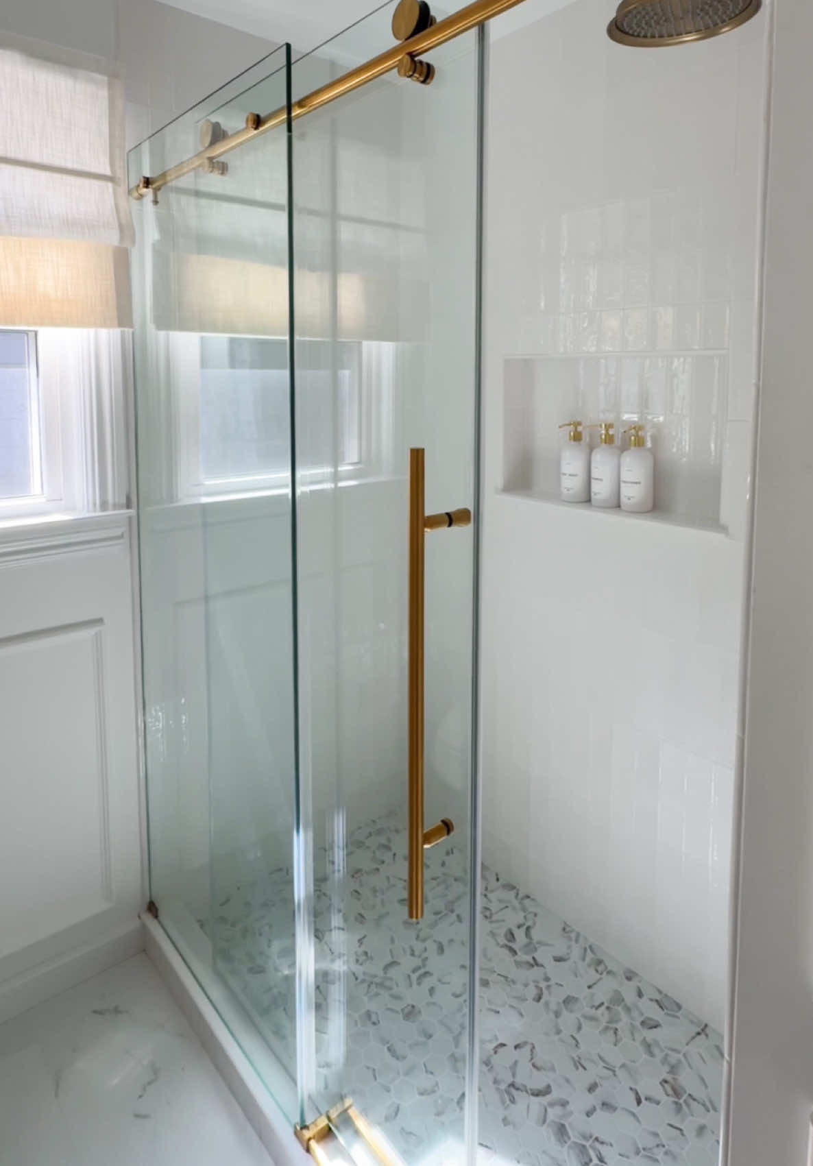 Our bathroom renovation is officially complete, and this frameless brass shower door from @VIGO was the finishing touch that pulled everything together! The modern, elegant design and clean lines make the space feel so luxe. I’m absolutely obsessed! ✨  Bathroom renovation, shower door, frameless door, modern bathroom, bathroom Reno Comment SHOP below to receive a DM with the link to shop this post on my LTK ⬇ https://liketk.it/5a53y #ltkwatchnow #ltkstyletip #ltkhome