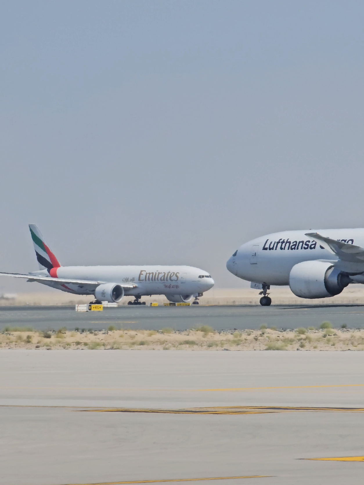 A6-EFL B77L #uae #dxb #emirates #fly #better #sky #airport #desert #takeoff #almaktoum #dwc 