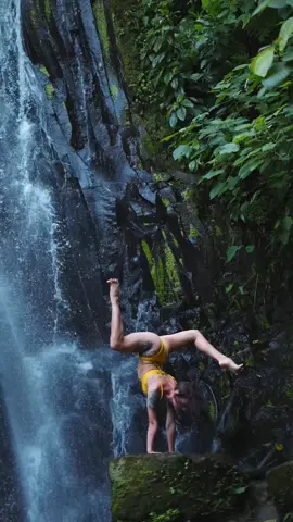BaliVibes #WaterfallMagic #HandstandLove #BaliAdventure #NatureAndStrength #WaterfallYoga #UpsideDownViews #TropicalBalance #BaliFlow #HandstandEverywhere #WildAndFree #ChasingWaterfalls #IslandEnergy #StrongAndGraceful #ZenInNature #BaliEscape #GravityDefied #YogaByNature #BaliDreaming #EmpoweredInNature 