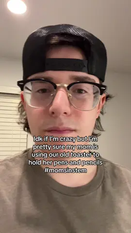 mom is using a old toaster to hold pens at her desk