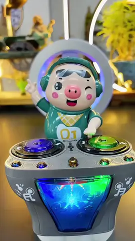 Electric DJ Pig with Music and LEDLights - A funny, cute swingdancing piggy toy with wibrantmusic and lights. Perfect for babiesboys, and girls who love fun andinteractive play. #DJPigToy #DancingPigToy #MusicAndLightsToy #SwingDancingPig #InteractiveToys #BabyToysUK #FunForKids #KidsEntertainment #CutePiggyToy #ParentingUK #Giftldeas #KidsGifts