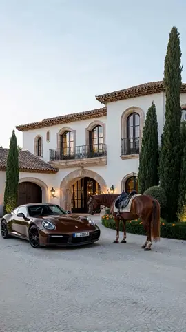 A luxurious Spanish mansion . . . . . . . . . . . . . . . #midjourney #mansion #ai #houses #white #horse 