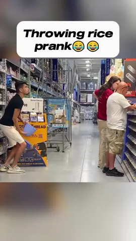 throwing rice prank! #laughing #funny #prankster #walmart  fake harmless prank lal