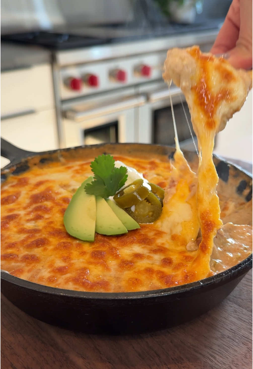 The best cheesy bean dip✨ Bean Dip:▪️2 tsp Avocado Oil▪️4 oz. Can Diced Mild Green Chilis, with juices▪️1 tsp Chili Powder▪️1/2 tsp Cumin▪️1/2 tsp Kosher Salt▪️16 oz. Can Refried Beans▪️1/2 Cup Cream Cheese (4 oz), softened▪️1/2 Cup Sour Cream▪️1/3 Cup Mild Green Salsa▪️3/4 Cup Shredded Mexican Blend Cheese▪️Tortilla Chips, for serving▪️ Toppings (optional):▪️Sour Cream▪️Sliced Avocado▪️Pickled Jalapeños▪️ 1️⃣ In an 8-inch cast iron skillet (or similar) over medium heat, add the avocado oil, mild green chilis, chili powder, cumin, and salt. Cook, stirring occasionally, until the chilis are sizzling and bubbling, 3–4 mins. 2️⃣ Add the refried beans, cream cheese, sour cream, and green salsa. Mix until all ingredients are evenly distributed, and continue cooking until bubbling and heated through, 3-5 mins. Turn off the heat, top with a layer of shredded Mexican blend cheese, and place the skillet on a baking sheet.  3️⃣ Transfer the skillet to the oven, 6 inches below the top heating element, and broil for 2-5 mins until the cheese is melted and browned. (Watch carefully while broiling because things can burn easily.) 4️⃣ Top with a dollop of sour cream in the middle, some sliced avocado, and pickled jalapeños. Serve with tortilla chips and enjoy!  ⏲15 minute total prep + cook time Recipe serves 4-6 (appetizer portion) For all recipes delivered to your inbox weekly (with printable PDFs) + access to the searchable recipe archive, subscribe to my newsletter via the link in my bio 😘 . #recipesoftiktok #recipesoftheday #recipeinspo  #EasyRecipes #beandip #easyappetizers 