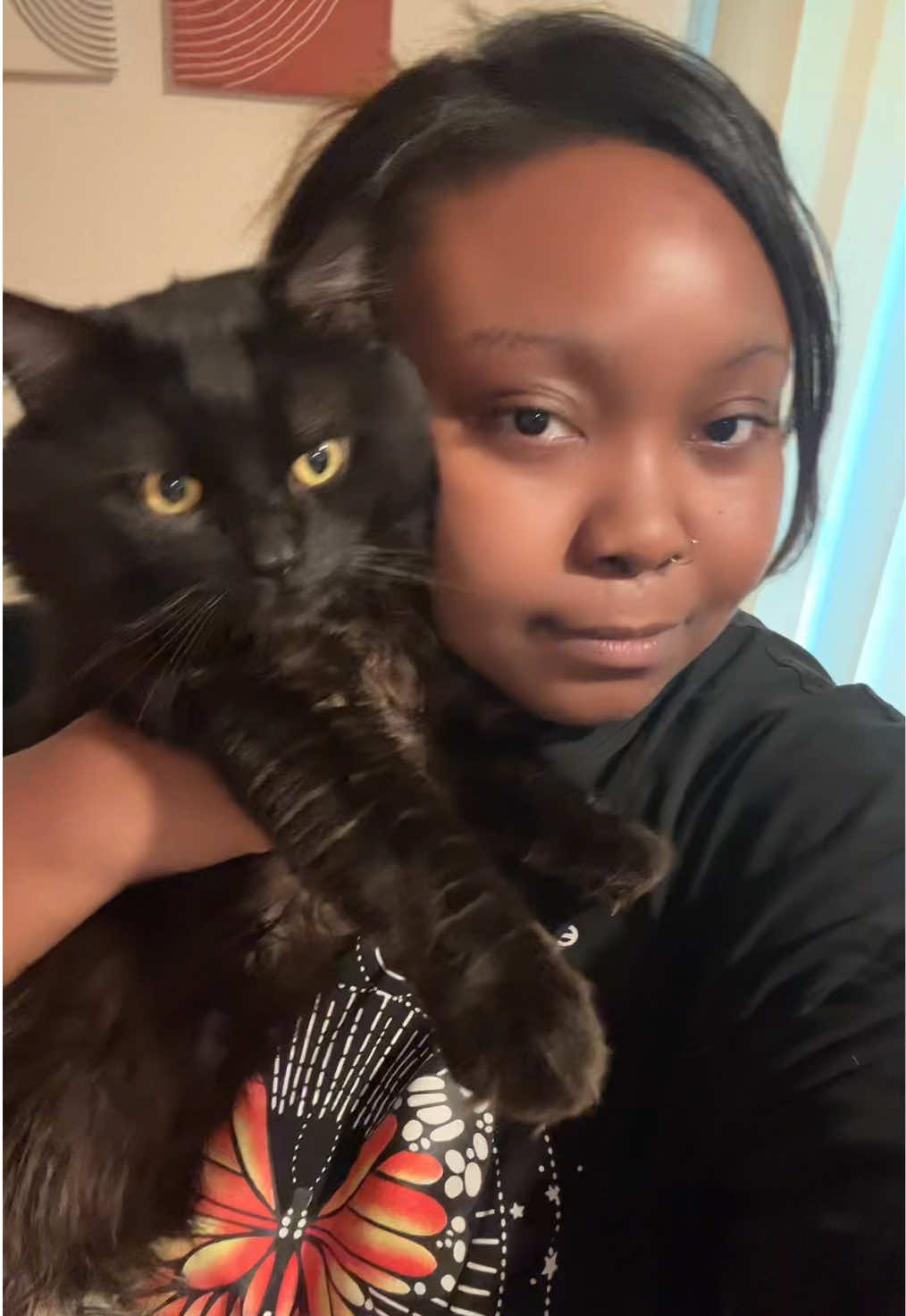 Black woman with a black cat 🐈‍⬛ Baby Onyx and I against the world, lol he hates when I hold him  . . #cattok #cattok #blackpeoplewithpets #blackpeoplewithcats #blacktiktokcommunity #blackgirltiktokers🤎 
