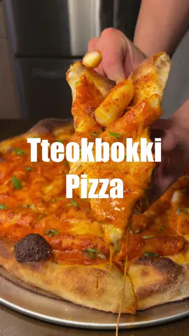 Rosé Tteokbokki Pizza. Didn’t cut up the rice cakes cuz I wanted it to still look like tteokbokki but def impractical. This was surprisingly hella good. Kinda like those pastries that put mochi in it. #tteokbokki #koreanfood #fusion #pizza #homemade #cheese #baking