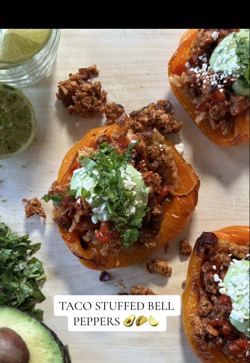 Taco stuffed bell peppers 🥑🌮🍋‍🟩 recipe below!!  Ingredients: @Drink Poppi for the good vibes 2 orange bell peppers 1lb ground chicken  1/2 red onion, diced  1 pkg @Siete Foods spicy taco seasoning  1/2 cup @FAGE Greek yogurt  1/2-1 avocado  Zest of 1 lime  Juice of 1 lime (more wedges for topping)  1 garlic clove  Drizzle of @Mike’s Hot Honey  Dash of cumin  A bunch of fresh cilantro (more for topping) Drizzle of @Yellowbird Foods sriracha @athenosfeta feta cheese  @lundbergfarms Spanish rice  Seasonings: @Simply Organic onion powder, salt, pepper, @Graza olive oil  Instructions: 1. Cut bell peppers in half, clean out all the seeds, then drizzle with olive oil and bake at 425° until tender  2. Heat olive oil in a pan on medium heat, and sauté red onion until translucent, then add in ground chicken and mince (pan I use is @Caraway Home ELLIETEALE10 for 10% off) 3. Once ground chicken is fully cooked, add in taco seasoning as directed  4. In a blender, combine yogurt, avocado, lime zest and juice, garlic, cilantro, honey, cumin, salt, pepper, and a little water and blend until smooth  5. Prepare Spanish rice as directed  6. Assemble, filling the bell pepper with rice and taco meat, then top with avocado sauce, feta, cilantro, and additional lime juice  7. Enjoy taco stuffed bell peppers 😚 #DinnerIdeas #healthyrecipes #mealideas #easydinnerrecipes #easydinner #healthydinner #highprotein