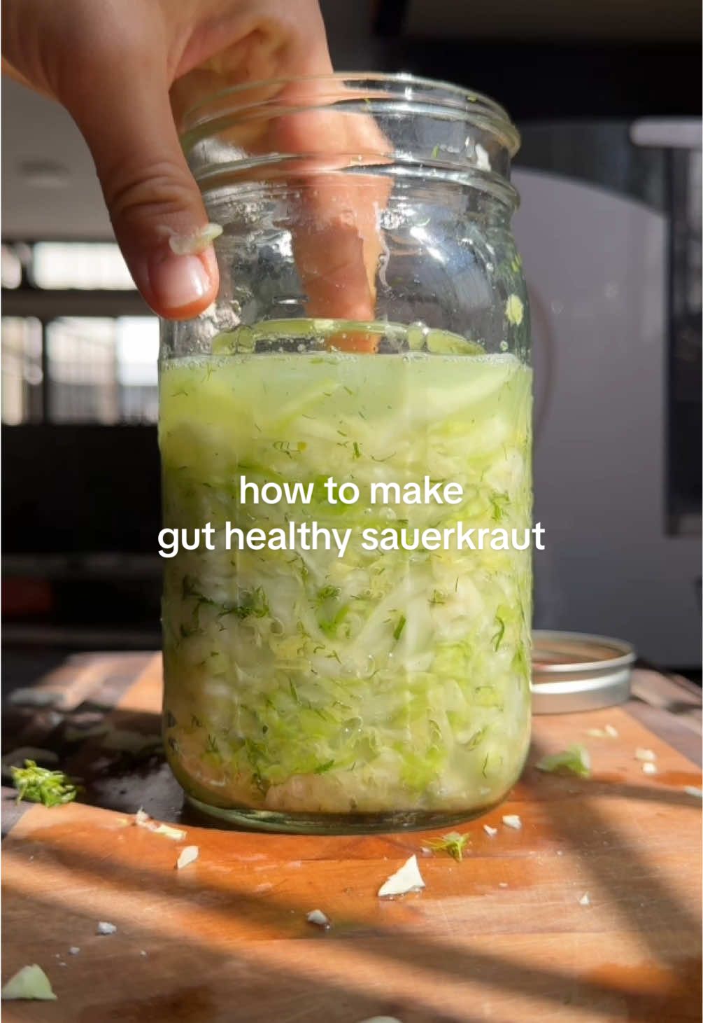 💰EPISODE 1 - BALANCED ON A BUDGET: Sauerkraut recipe 👉this series is about to save you so much money so make sure you’re following and share this with a friend 😅no more spending $10/week on saurkraut, make it at home for a fraction of the price!!!  you need:  - head of green cabbage  - food scale  - sea salt  - herbs or spices of choice (dill, caraway) - glass jar - fermentation weight 1️⃣Shred the cabbage and weigh that in grams. Multiply that by 2.5% (.025). Add that amount of salt in grams to the cabbage. Massage for 5-10 minutes until the cabbage is wilted and water is released. Add herbs or seasonings of choice. 2️⃣Pack that into a sanitized glass jar, pushing down so that it is submerged in liquid. Add a glass fermentation weight and seal with a lid.  3️⃣Let sit in a dark spot at room temp. Check daily for the first week and slightly open the top to release any gas build up.  4️⃣Let sit for 3-4 weeks until it reaches your desired flavor! Make sure it stays below the brine the entire time. Transfer to the fridge and enjoy!  👉I have a more detailed recipe with measurements in my cookbook !  👇Are you excited for more budget-friendly content?? See you for episode 2 !!  #guthealth #nutrientdense #fermentation 