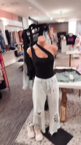 Turn heads in this sleek, asymmetrical black top — the perfect mix of edgy and chic for your day-to-night slay. Designed to flatter, built to stun.  #TrendyLook #OutfitInspo #ChicStyle  #WardrobeGoals #OOTDStyle #FashionistaLife #AsymmetricalTop #BlackTopVibes #StatementTop #SummerTopStyle #SleekAndStylish