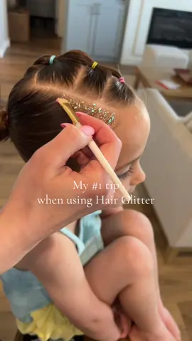 A little bit goes a long way! Try adding it to a part line, and it’ll make your hairstyle pop without feeling like it’s too much!  This is the new Sunroof glitter from @Dittobug-Hair The perfect mix of pink, blue, and yellow and of course we matched the ponytails to it too. 💕😍 #easter #spring #hairtutorial #hairstyle #hairtok #viralhair #kidshairstyles #easyhairstyles #schoolhairstyles #trending #hairideas #hairinspo #Lifestyle #MomsofTikTok #shorthair #slickedhairstyles #youngmom #cleangirlaesthetic #relatable #bowhairstyle #girlhairstyle #toddlerhair #grwm #momanddaughter #toddlersoftiktok #hairglitter 