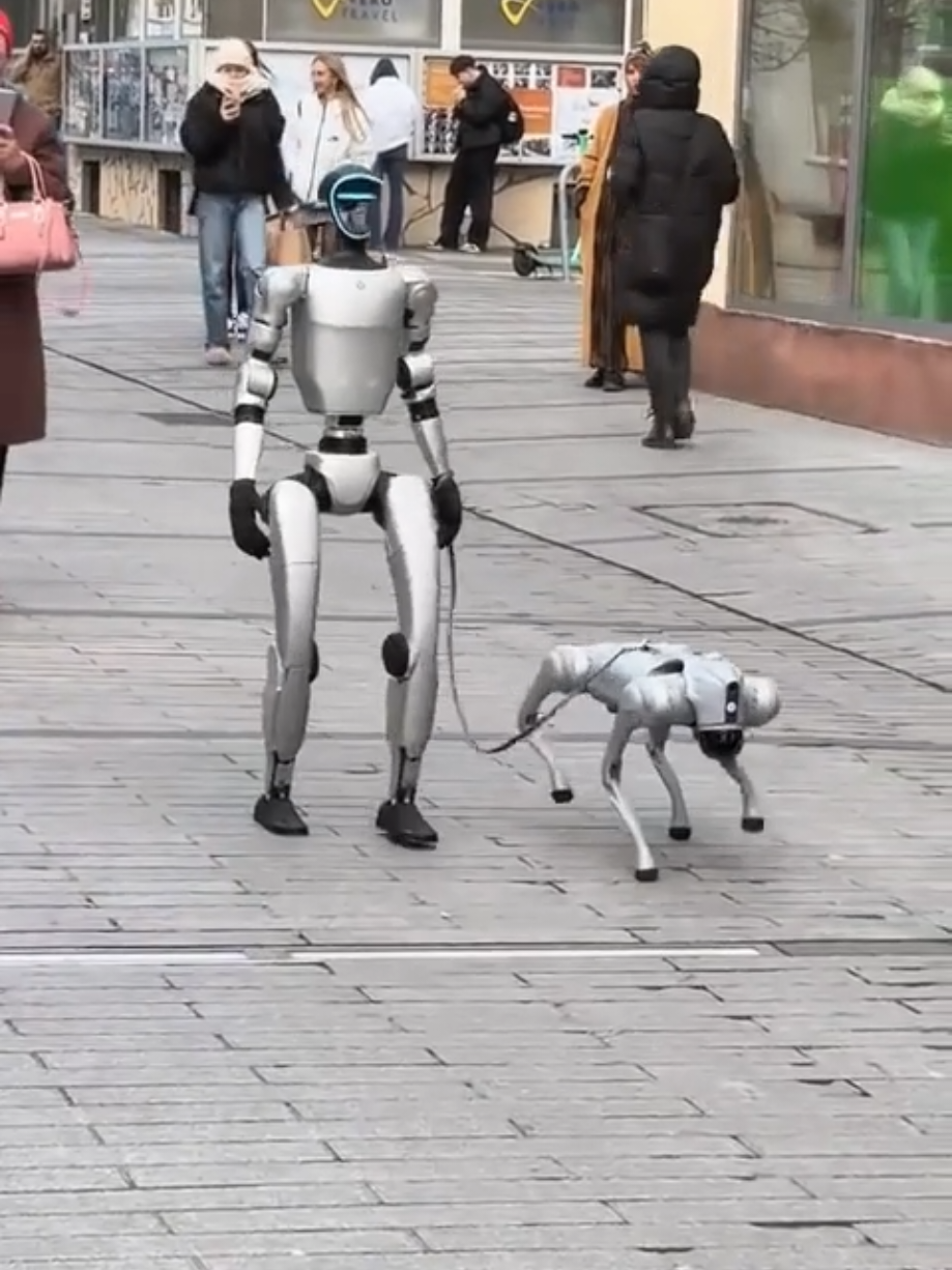 Tesla robot walking the dog, this is not science fiction, this is the real world#tesla #robot #walk #movie #smart 