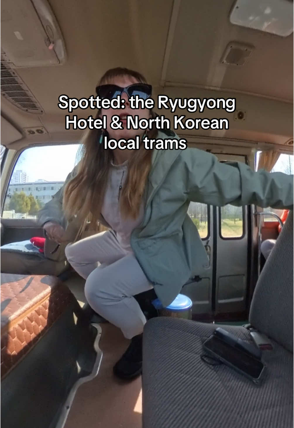 Driving through Pyongyang was originally filming the other side when I noticed the Ryugyong Hotel, famously the “worlds tallest unoccupied building” - and happily caught a local North Korean tram in there, too. #pyongyang #tram #trams #ryugyonghotel 