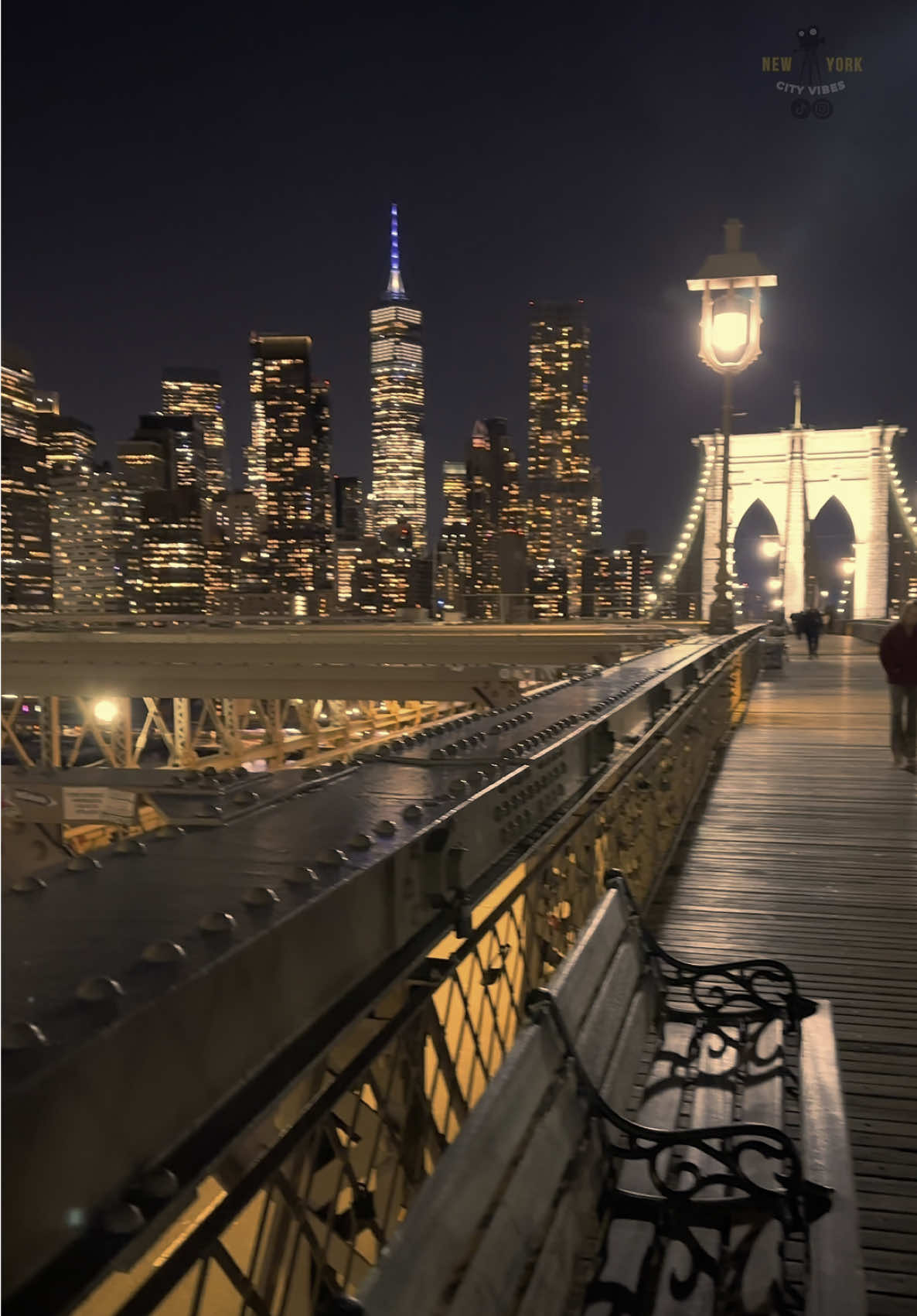 New York City at night from the heart of Brooklyn Bridge. 🌃🌉✨🗽  #newyorkcity #brooklynbridge #nycnight #citylights #manhattanskyline #nightvibes #urbanexploration #neonlights #bigapple #nyclife #streetphotography #cityatnight #photographylovers #travelblogger #nightshots #nightowl #explorenyc #wanderlustcity #concretejungle #timelesscity #nycnightscape #nightaesthetic #usaexplored #nycnights #brooklynvibes #iconicview #citydreams #lightsinthecity #nycstreets #cityphotography