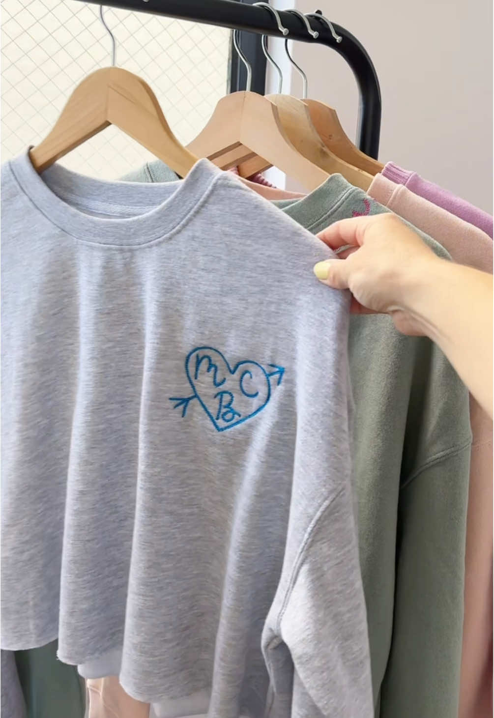 Looking for the perfect gift for a special mom in your life? A custom and cozy sweatshirt is the perfect thing to show you care! Stay tuned for more of these cute embroidered custom styles just for Moms #mothersdaygift #giftformom #babyshowergift #customsweatshirt #customembroidery #smallbusinessmom #embroideredgifts 