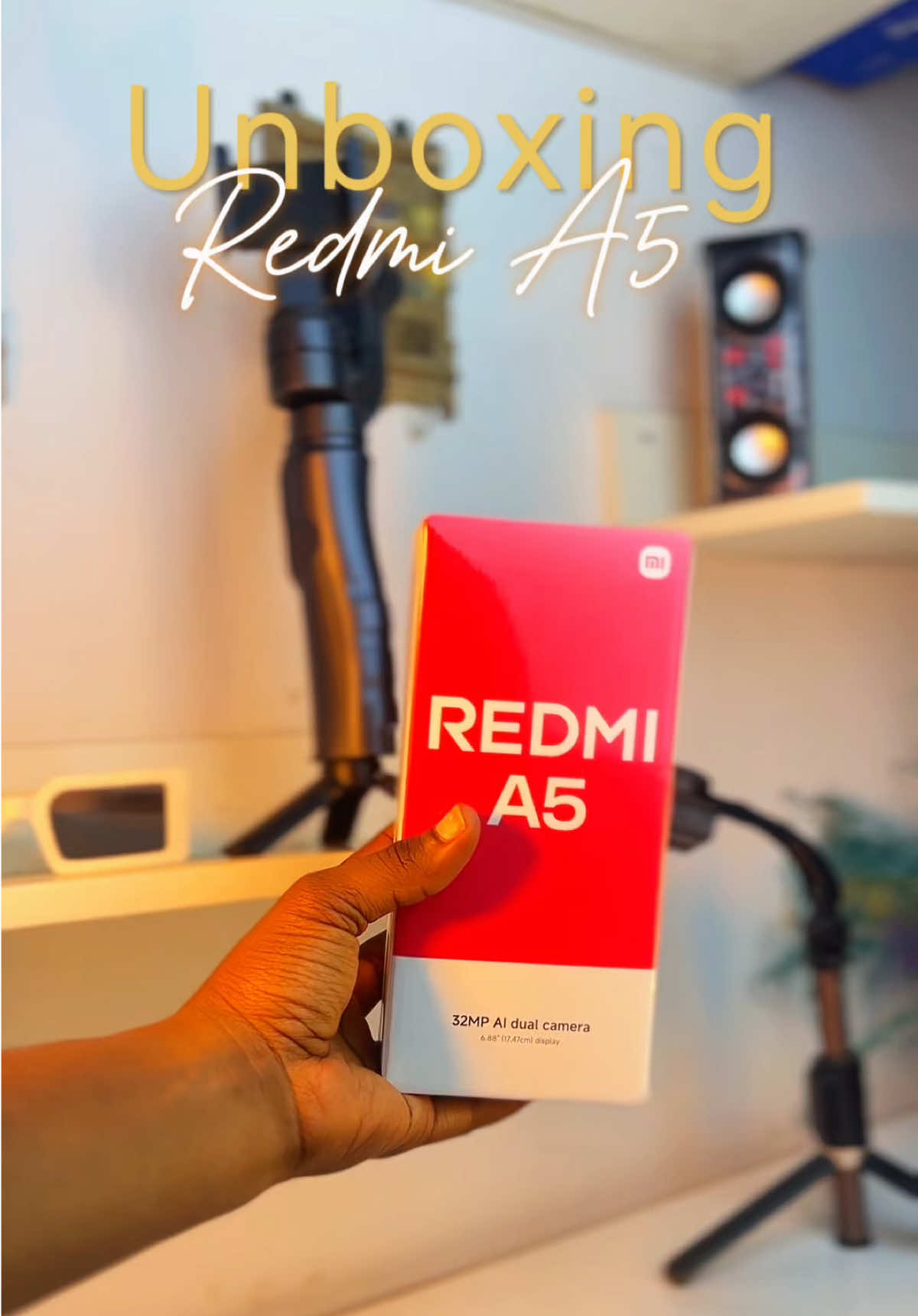 Unboxing the Redmi A5, This device has a starting price for the 3 + 64 gb  =99,700 naira or 62.35 dollars  Specifications: 1. 6.88 inch display with 120 hz refresh rate  2. 5200mah battery  3. 32mp AI selfie camera  4. Comes with 4 colors  5. Unisoc T7250 chipset processor etc……  #xiaomi #xiaominigeria #redmia5 #asmr #unboxingvideo #redmi 