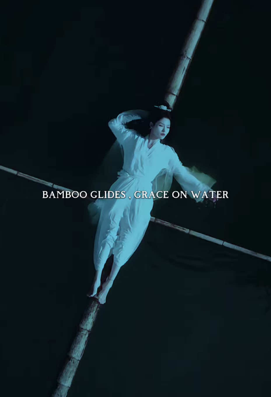 Bamboo Glides 🎋 Balancing tradition on water. Could you master the art of balancing on a single bamboo pole across a river⁉️ • • • ##BambooDrifting##CulturalHeritage##ArtOnWater##BalanceAndGrace##TraditionInMotion##ChineseCulture##MasterTheDrift##FloatingArtistry#fyp #fypシ #fypシ゚viral 