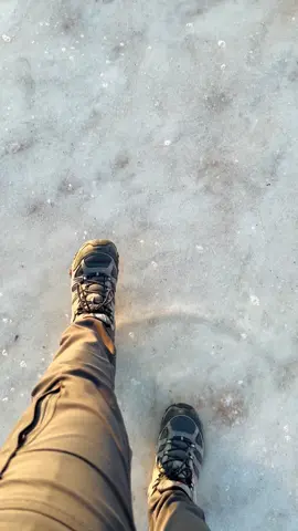 Walking on flooded salt flats in the badwater basin. The storm that was approaching waited for the sun to set, setting up this amazing golden hour.  This isnt the first time the salt flats have flooded in recent times, but it is considered rare.  #deathvalley #nationalpark #explore #explorer #adventure #adventuretravel #desert #landscape #saltflats #badwaterbasin 