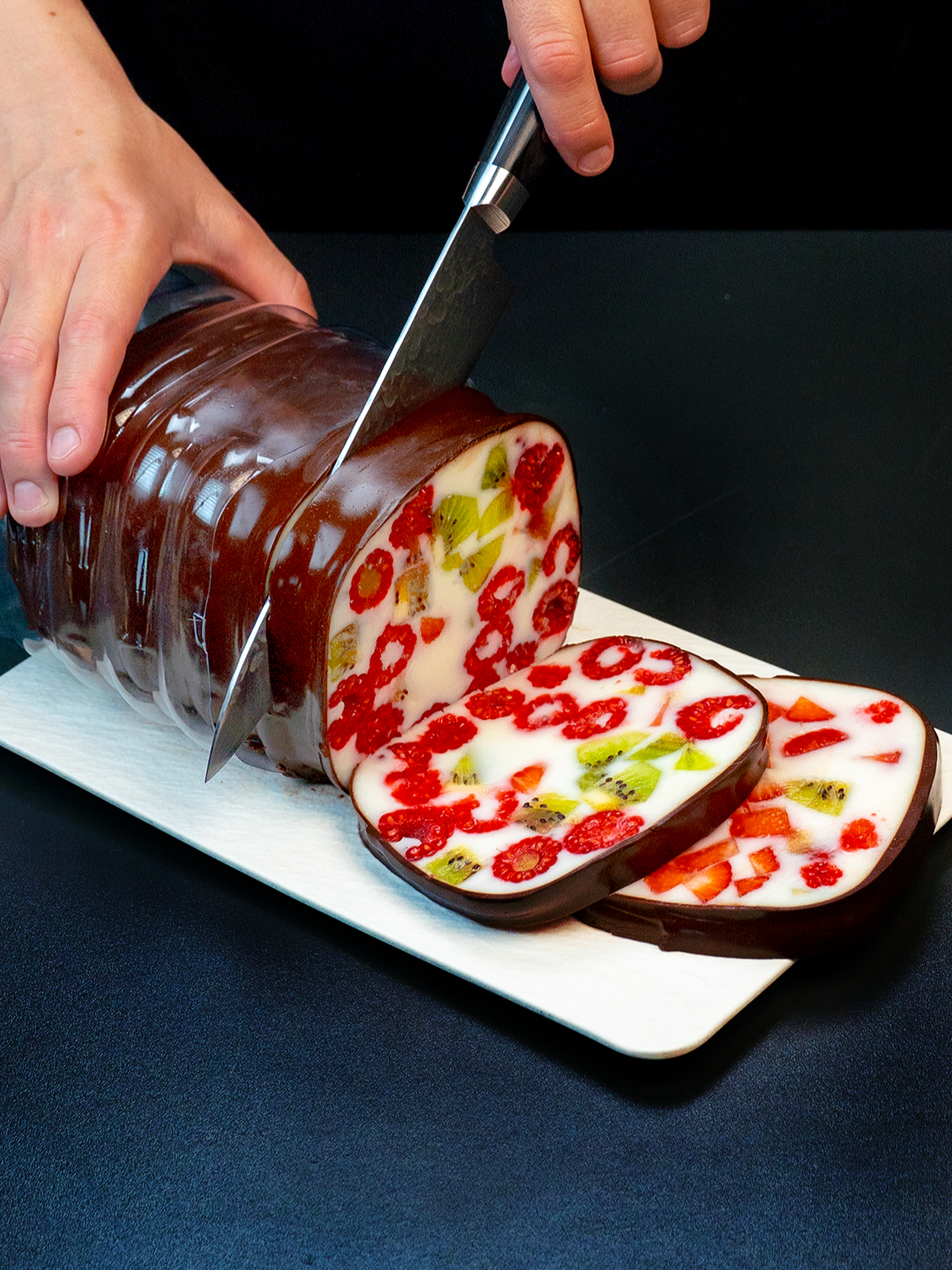 I always make this Easter dessert! Simple, quick and delicious Ingredients sugar: 250 g (8.8 oz) agar agar: 32 g (1.1 oz) milk: 2.2 l (74 pt) strawberries: 400 g (14 oz) kiwi: 400 g (14 oz) raspberry: 400 g (14 oz) sugar: 180 g (6.3 oz) agar agar: 16 g (0.6 oz) cocoa: 180 g (6.3 oz) milk: 500 ml (17 fl oz) dark chocolate: 170 g (6.0 oz) The drink strawberries: 300 g (11 oz) water: 70 ml (2.4 fl oz) lemon: 2 pc water: 50 ml (1.7 fl oz) lemon: 5 slices honey: 60 g (2.1 oz) mint: 20 g (0.7 oz) water: 550 ml (19 fl oz)