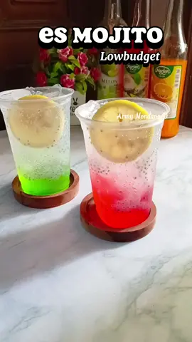 Es Mojito....♥️💚 Ide Jualan Minuman Kekinian ‼️  Bahan - bahan : ☘️ Sirup Cocopandan 30ml  ☘️ Sirup Melon 30ml ☘️ Biji selasih 1sdm/cup ☘️ Irisan Lemon 1pcs/cup ☘️ Air soda 100 ml /cup ☘️ Es batu secukupnya  ☘️ Cup 16 Oz Modal / HPP sesuaikan saja dengan daerah masing² ya. Selamat mencoba ‼️  #Esmojito #SirupMarjan  #EsMojitococopandan  #EsMojtoMelon #EsViral  #ResepEsmojito #FYP  #Esmojitolowbudged  #Idejualan #MinumanViral  #Minumankekinian #fypシ゚  #Homecafe #minumanviral  #fyptiktok #fyppppppppppppppppppppppp 
