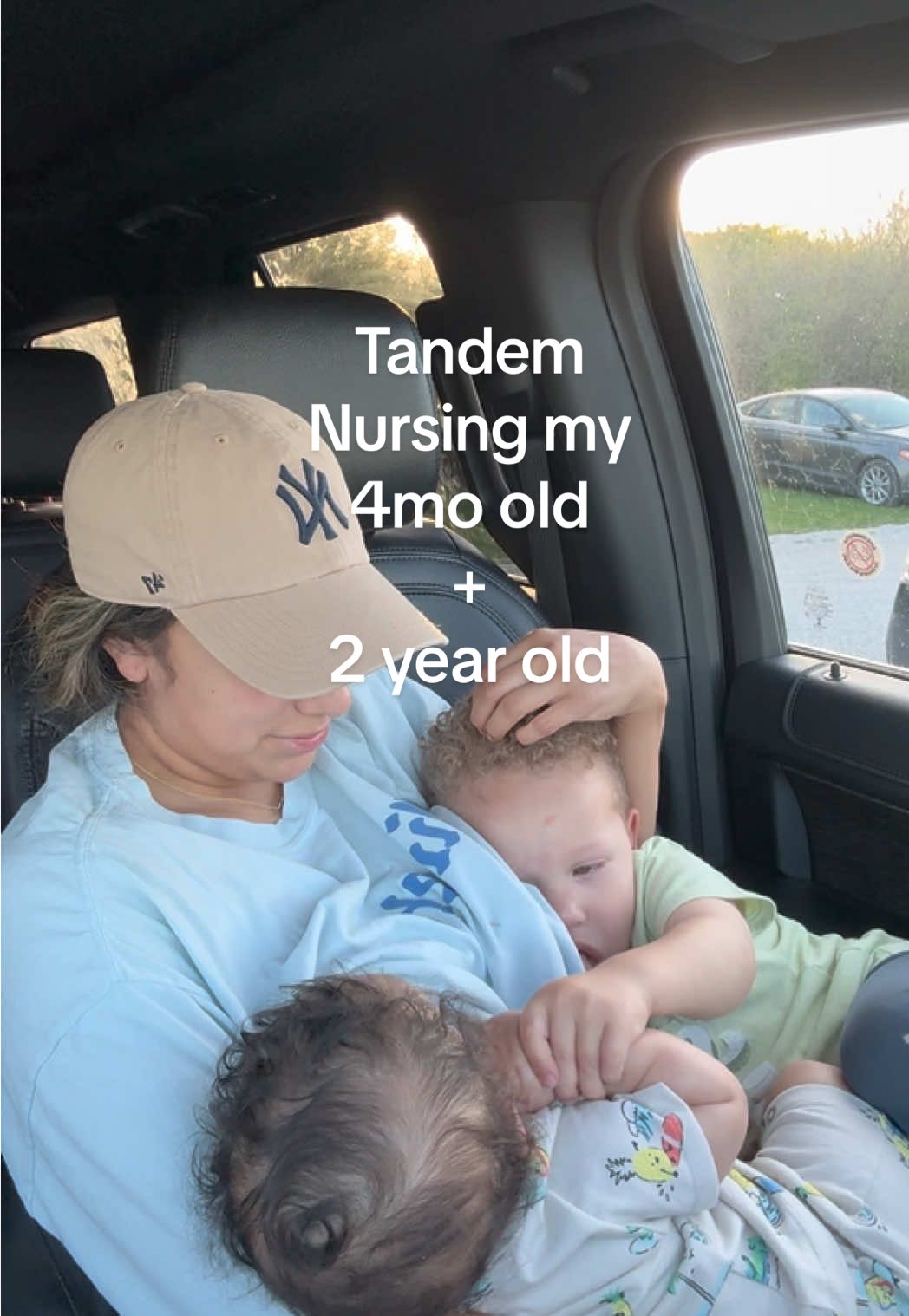 I thought this would be a great way for them to bond but instead my 2yo is trying to make my 4mo punch himself 😅  #tandemnursing #boymomlife #momof6kids  #breastfeeding #breastfedbaby #2under2 #4under5 #postpartumjourney #motherhood 