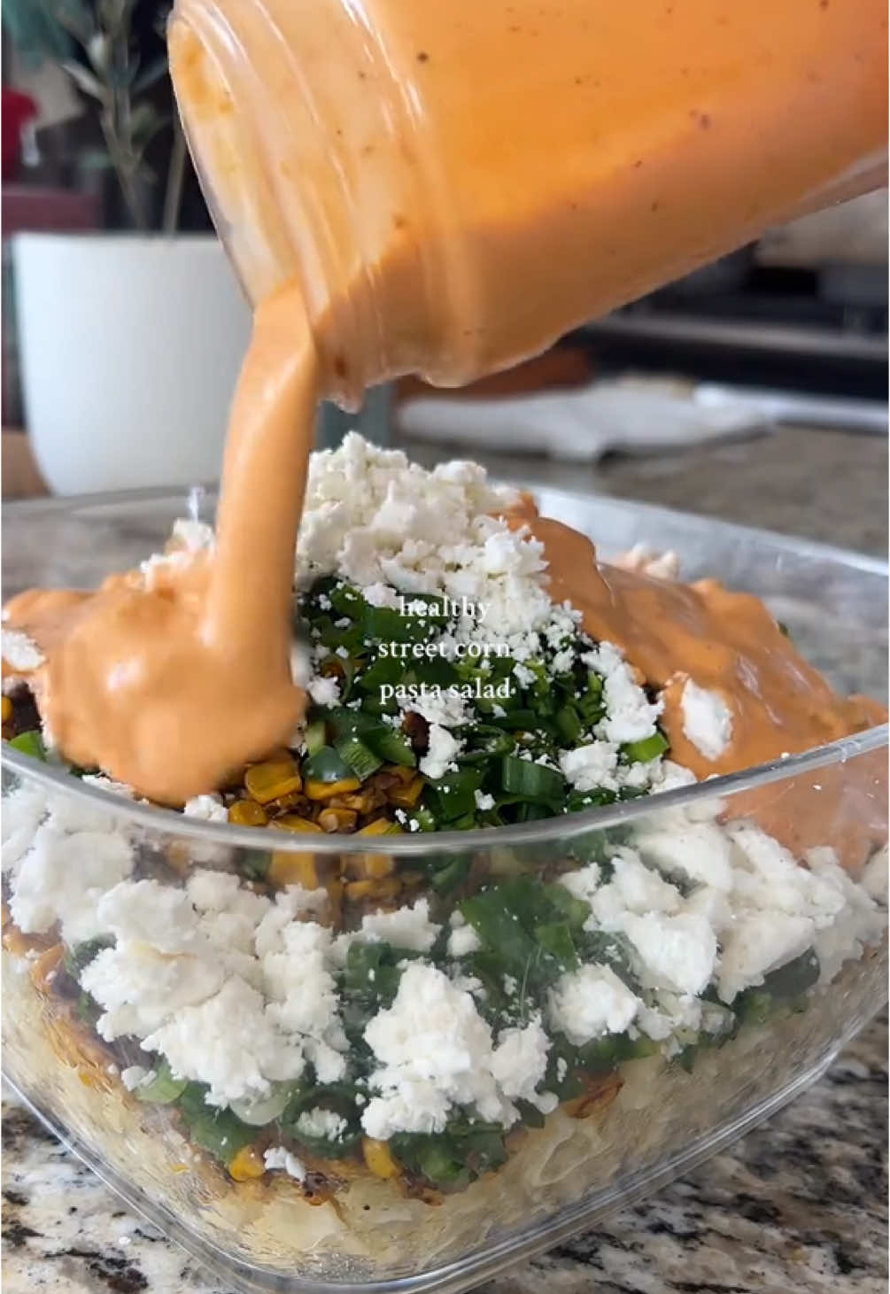 Deliciously savory street corn pasta salad by 🎥: @Cassia Sian !🌽🥗 - - Check out their page for more amazing recipes!✨ - - Recipe: Ingredients: - 16 oz small pasta shape, of choice - 3 Tbsp oil (high heat oil works best!) - 30-32oz can of corn, drained well - 3 cloves garlic, minced - 0.5-1 jalapeño, seeds removed, minced (depending on your desired spice level) - 0.5 cup cilantro, minced - 0.5 cup green onions, chopped (& more for topping) - 1/3 cup cotija cheese (& more for topping) - 0.5 cup Greek yogurt - 0.5 cup mayonnaise - 4 oz can chipotle peppers in adobo - 0.25 cup lime juice - Salt & pepper, to taste Directions: 1. Heavily salt a big pot of water. Boil & cook pasta according to package instructions. Drain & set aside to let pasta cool 2. For the corn: Heat high heat oil in a large pan over medium-high heat. Add drained corn to the pan, salt & pepper to taste, and sauté for at least 7 minutes (or until corn is charred) // turn heat down to medium-low, add garlic, cook for another 3 minutes // remove from heat & let cool 3. For the dressing: in a blender, place Greek yogurt, mayo, chipotle peppers (with adobo sauce), lime juice, 1 tsp salt & pepper // blend until smooth (taste for any added salt & pepper if needed) 4. In a large bowl, add cooked pasta, charred corn, minced jalapeño, chopped cilantro, chopped green onion, & crumbled cotija cheese. Pour sauce over the top & toss to combine 5. Add your favorite protein of choice, top with extra cheese & green onions OR just eat it straight from the bowl! Enjoy! - - #healthy #pastasalad #pasta #streetcorn #elote #moderation #mindfulness #yummy #savory #Recipe #healthyrecipes #mealprep 