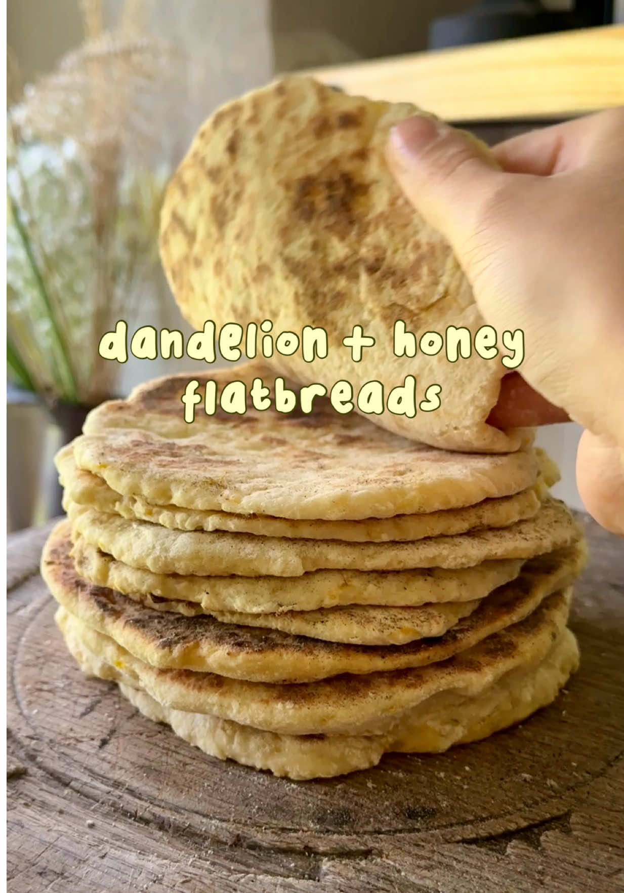 | served these beauties up at my last Spring foraging workshop and they went down a treat! 🌼 Alongside baba ghanoush, a sticky weed, nettle and dandelion green chimichurri and a wild weeds salad! YUM 🤤 Here's the full recipe for you: Ingredients - 250g Greek Yoghurt (works with dairy or VGN  270g Self-Raising Flour + more if needed 1 TBSP Olive Oil 1 TBSP honey Yellow petals from 10 dandelions Method: Add all your ingredients to a bowl and combine until you have quite a wet (but manageable) dough. Turn your dough out onto a heavily floured surface and bring together to form a ball. Cut into 6 even pieces. Flour a rolling pin and roll each piece into a circle around 1cm in thickness.  In a dry frying pan on medium heat, cook each bread for around 2 minutes on each side, until you see air bubbles on the top side and brown spots appear on the underside. Allow to cool for a few minutes and enjoy! Remember that dandelions are a source of food for our pollinators, so only pick a little from areas of abundance! #foraging #dandelion #wildfood