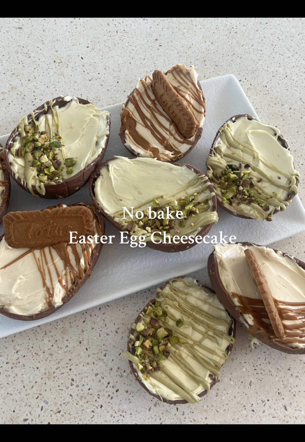 🐣 EASTER EGG CHEESECAKES 🐣  If you’re in charge of desserts this year I have you sorted! Two options of these super quick (and cute!) Easter treats - and they require no baking! INGREDIENTS: • Hollow Easter eggs • Digestive biscuits • Unsalted butter • Philadelphia Cream Cheese • Icing Sugar • Biscoff spread OR Pistachio spread TOPPINGS: • Crushed pistachio OR biscoff biscuits STEPS: 1.Heat up a knife with hot water and cut Easter eggs in half 2. Crush biscuits and mix in melted butter until mixture holds together 3. Put a layer of biscuit on the base on eggs and put in fridge to set 4. Mix Philly and icing sugar and then add your desired spread filing (make it as sweet as you like!)  5. Smooth an even layer of the cheesecake mixture in each egg 6. Drizzle melted spread to decorate and top with your choice of crushed pistachio or biscuit! 7. Place back in fridge to set Enjoy and Happy Easter ❤️‍🔥 J x #cook #Recipe #easter #dessert 