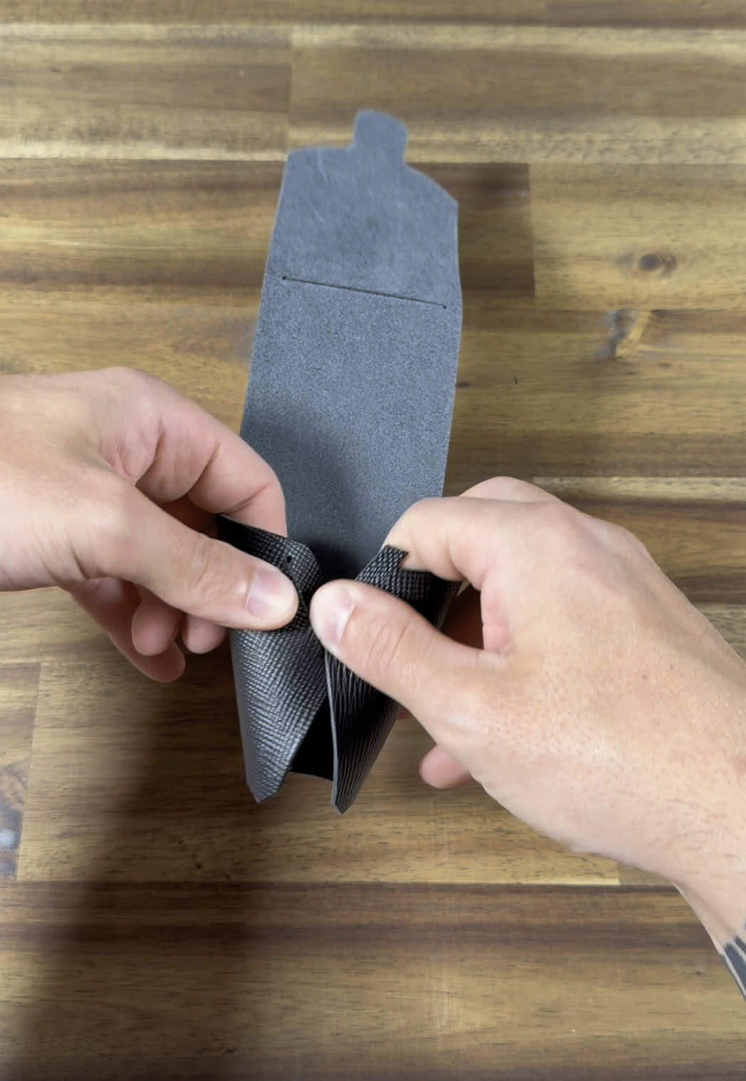 Folding a wallet #leatherasmr #leathercompany #leathercrafttools #handmade #stitchlesspattern #edc #leathertokleathercraft #oddlysatisfying #leatherworkshop #leatherworkspace #leathercrafttutorials #satisfying #leatherfolding