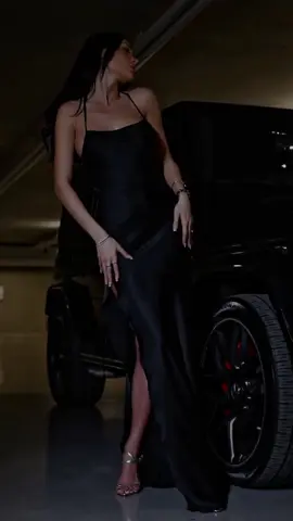 She’s not just dressed in black; she embodies it. 🖤✨ Rolling in the G-Wagon, where elegance meets power. 💃🚙 #LuxuryLifestyle #BlackOnBlack #GClassVibes #EleganceInMotion #FYP #Viral #StyleGoals #WealthVibes #LuxuryCars #FashionForward