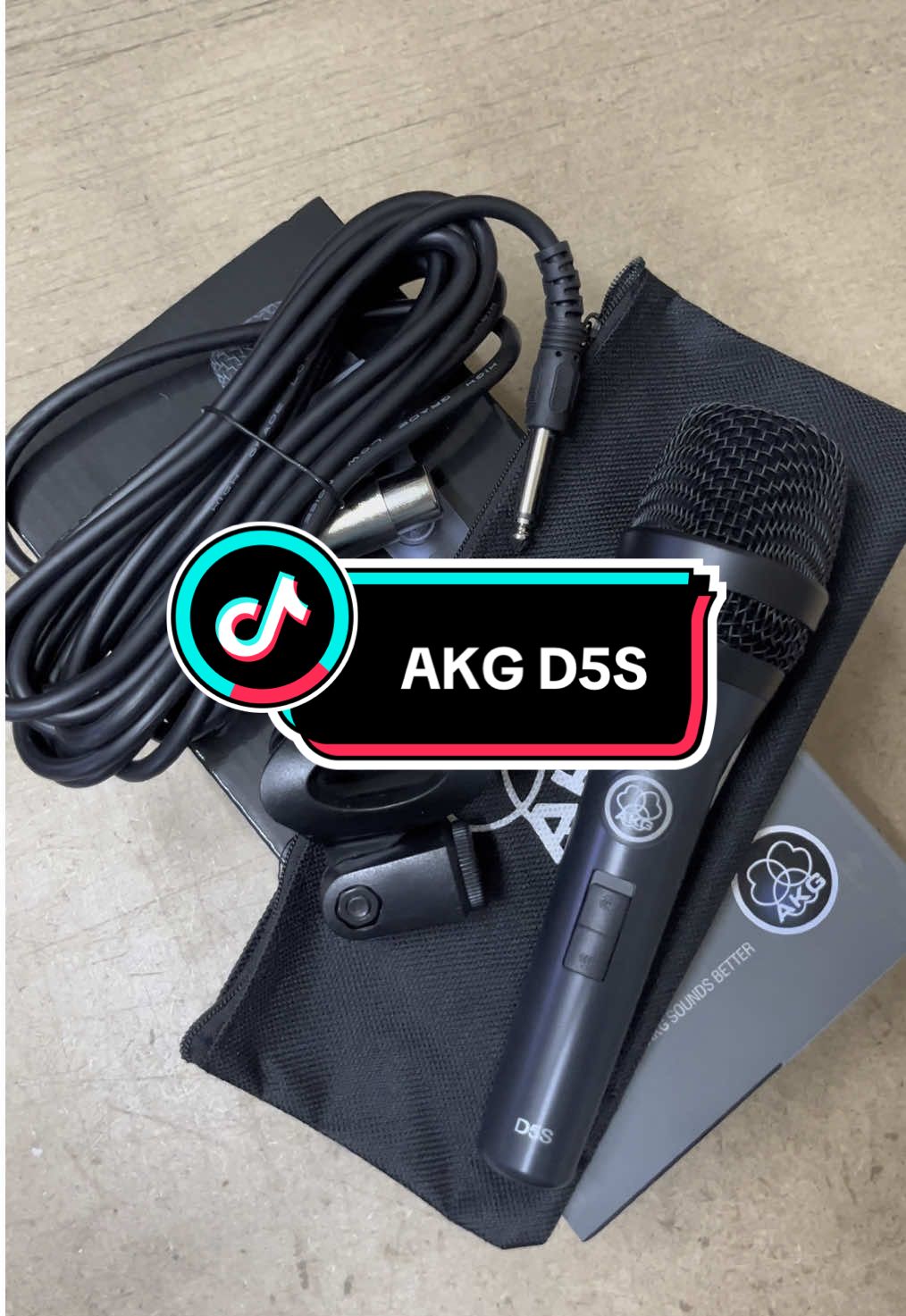 AKG D5S VOCAL DYNAMIC MICROPHONE 🎤 The D5S has the same mechanical, electrical, and acoustic characteristics as the D 5 and features a noiseless on/off switch. The D5S dynamic vocal microphone delivers a powerful sound even on the noisiest stage. A superb mic for lead and backing vocals. Its supercardioid polar pattern ensures maximum gain before feedback. The mic stands for a crisp sound that cuts through every mix. The thickness of the microphone's diaphragm varies across its diameter. The Laminated Varimotion diaphragm deep-drawing process allows the diaphragm itself to be fine-tuned with no extra tuning resonators, leading to a quantum leap in audio performance. The dual shock mount eliminates any kind of mechanical noise for trouble-free live use. The audience will hear nothing but the pristine sound of your voice! #wiredmicrophone #microphonemurah #akgmicrophones #fyp 