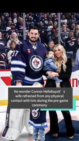 No wonder Connor Hellebuyck’s wife refrained from any physical contact with him during the pre-game ceremony #us #usatiktok #fy #ConnorHellebuyck #celebrity #entertainment #fyp 