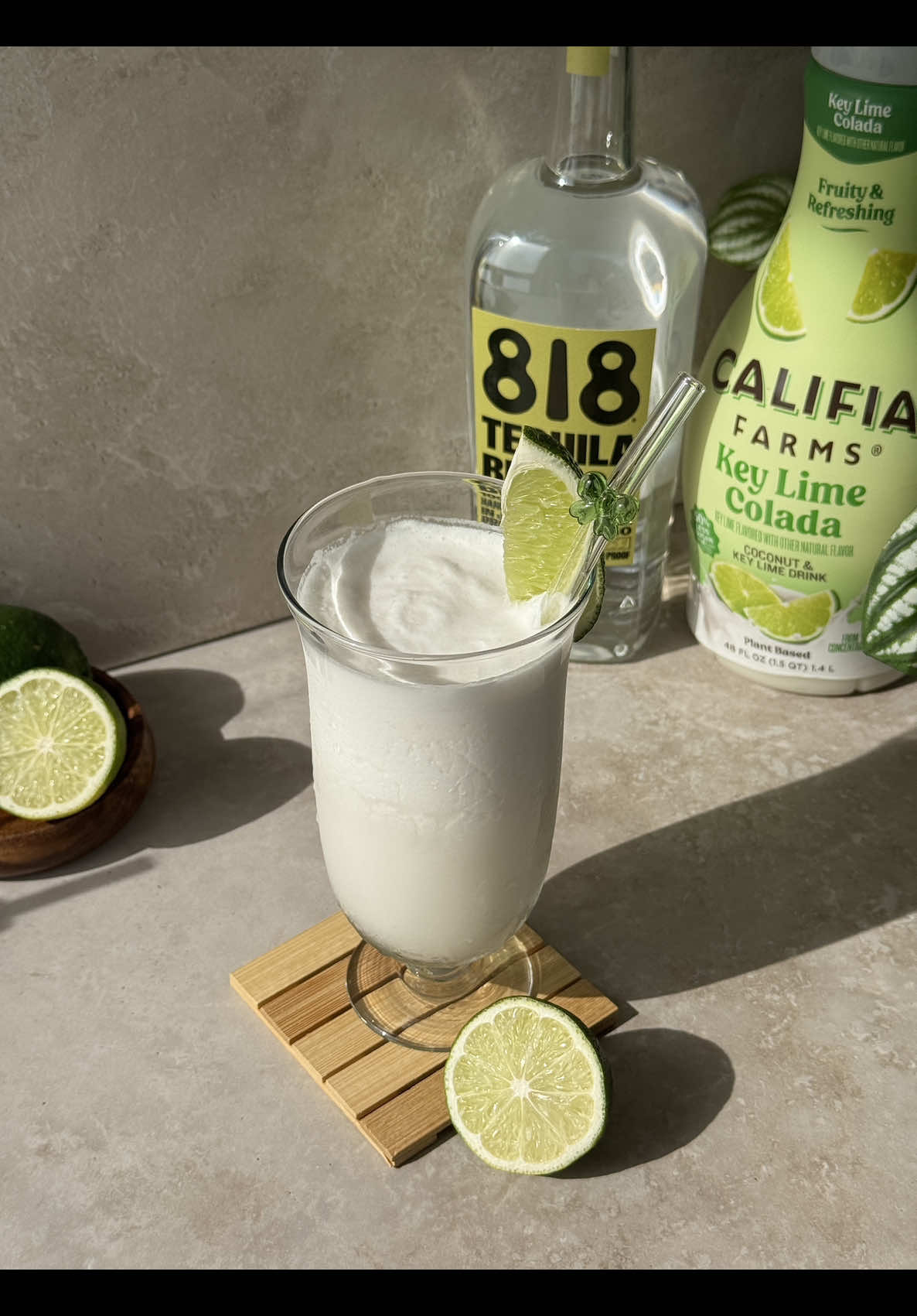 Make the Key Lime Colada at home with Califia Farms' Key Lime Colada Refresher and 818 Tequila Blanco. Recipe below, cheers! 🍋‍🟩  Recipe (makes 2 servings): - ﻿﻿4 OZ @drink818 Tequila Blanco - ﻿﻿2 OZ @Califia Farms Key Lime Colada Refresher - ﻿﻿4 OZ cream of coconut - ﻿﻿1 OZ fresh lime juice - ﻿﻿2 cups ice Prep: 1. ﻿﻿﻿Combine all ingredients into a blender and blend to combine. 2. ﻿﻿﻿Garnish with a lime wedge.