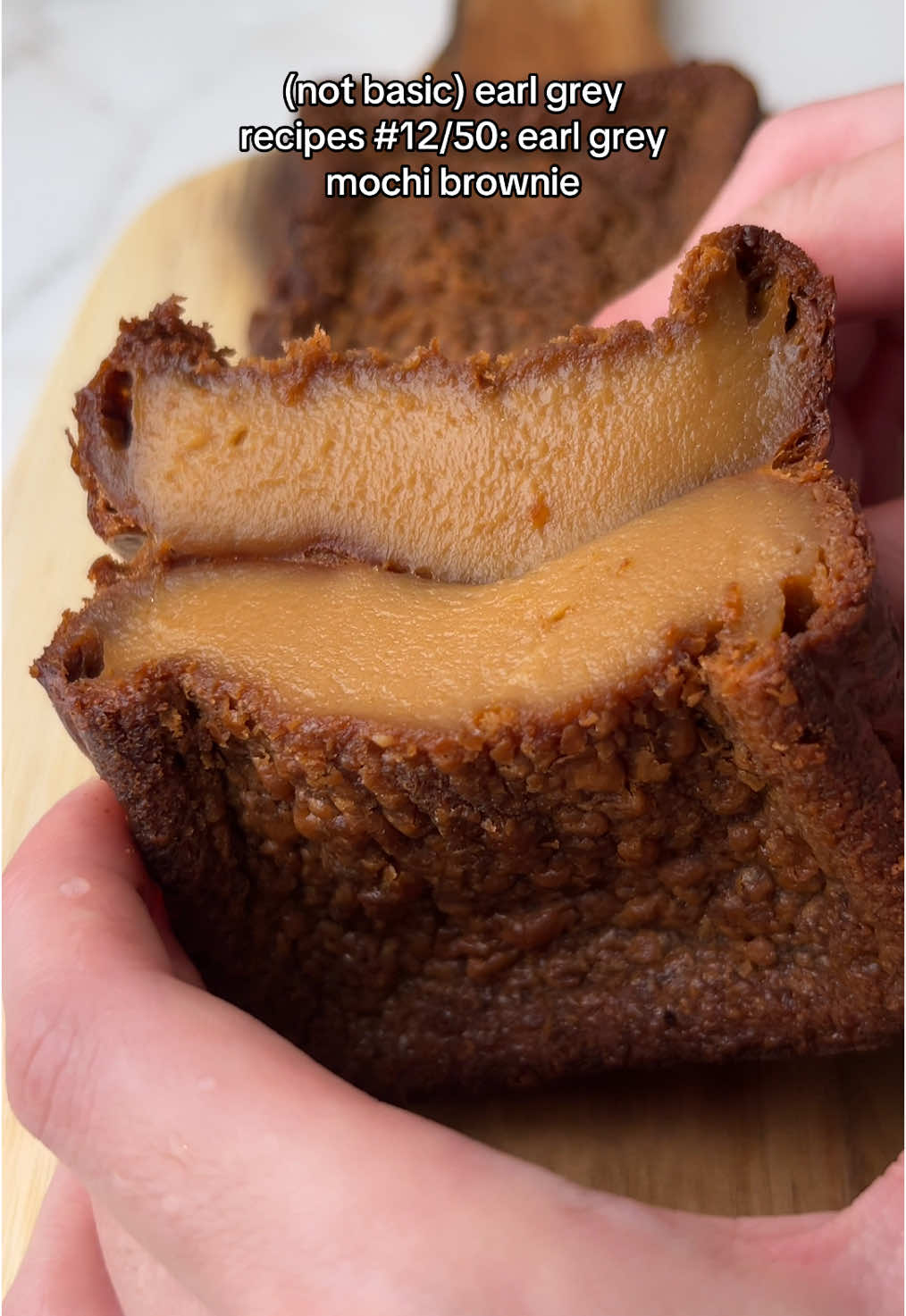 50 shades of earl grey recipe #12: these earl grey mochi brownies are chewy sweet and packed full of earl grey flavour. They look kinda sus but we know it has a great personality.  earl grey mochi brownies recipe 1 cup glutinous rice flour 1/3 cup sugar 30g butter 1 egg 1 cup milk 6 earl grey tea bags pinch salt Preheat oven to 175C. Bring milk to a boil then add in earl grey tea bags and let steep for 20 mins.  Once cool, squeeze earl grey tea bags to get all the earl grey juice out.  Sift dry ingredients together. Mix wet ingredients in another bowl. Pour wet into dry. Stir until there are no lumps.  Pour into baking pan.  Tap pan to get rid of bubbles. Cover pan with aluminium foil to prevent browning too much. (i forgot to do this so mine were really brown) Bake for 1.5 hours or until toothpick comes out clean. #50shadesofearlgrey #earlgreyrecipes #earlgrey #mochi #brownies #EasyRecipe #bakingtherapy #bakingtiktok #viral 