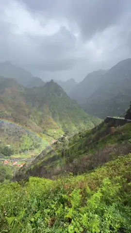 Beautiful rainbow spotted!  A rainbow is an optical phenomenon caused by refraction, internal reflection and dispersion of light in water droplets resulting in a continuous spectrum of light appearing in the sky. The rainbow takes the form of a multicoloured circular arc. Rainbows caused by sunlight always appear in the section of sky directly opposite the Sun. Rainbows can be caused by many forms of airborne water. These include not only rain, but also mist, spray, and airborne dew. #madeira #madeiraisland #rainbows #rainbow #mountains #mountain #view #views #madeiraportugal #explore #explorepage✨ #valley #clouds #cloud #rain #colours #4k #nature #natureza #videos #sky #greenery #travel #discover #discovery #miradouro #portugal🇵🇹 