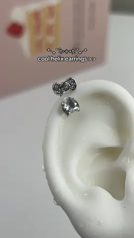 So cute and hello kitty inspired too😭 #helix #helixearrings #helixjewelry #jewelry #piercing #helixpiercing #earrings #y2k #y2kearrings #y2kjewelry 