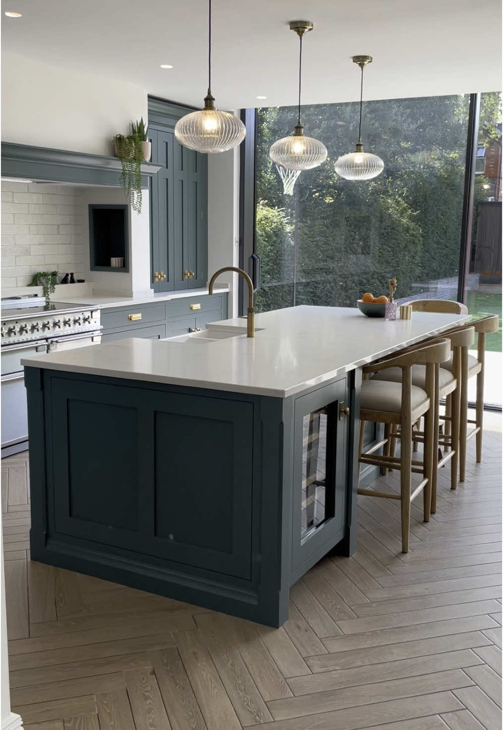 Another beautiful classic kitchen project completed for a lovely family in Hale. We just loved working in this room. It was a huge space with an abundance of natural light pouring in through the patio doors.  The cabinetry has been hand painted in Farrow & Ball’s Inchyra Blue - a rich colour that can appear more grey, blue or even green depending on the lighting and time of day.  What do you think of this space?  #luxurykitchen #halecheshire #kitchendesigner 