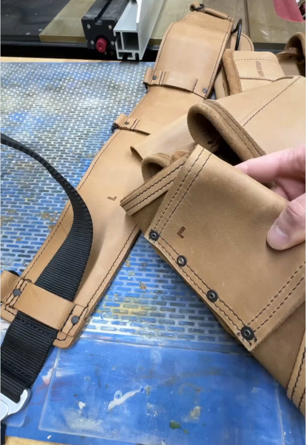 The Firm Grip Build A Rig Carpenter’s Belt uses Velcro wraps to attach pouches, making it easy to swap, shift, and lighten the load as needed. It’s built for flexibility when your setup needs to change quickly. The Build A Rig Leather Framing Belt uses leather loops that slide onto the belt and stay locked in place, designed for tough, heavy-duty work. Once it’s on, it’s not going anywhere. Both belts use the same 6” padded belt, so you can mix and match depending on what the job calls for. #FirmGrip #ToolBeltLife #BuildARig #WorkshopSetup #ToolTok #WoodworkingGear #DIYTools #BeltGameStrong @Firm_Grip_Gear 