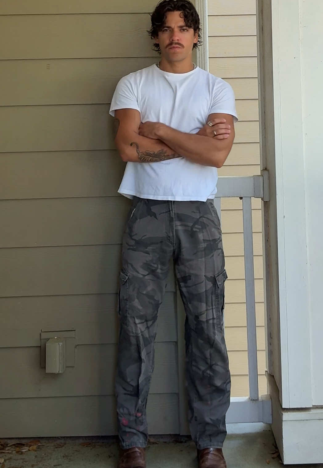 I can feel it — this summer is the revival of 2000s bangers. camo wranglers + square toe cowboy boots. #OOTD #outfitinspo #FitTok #mustache #wrangler #fyp 