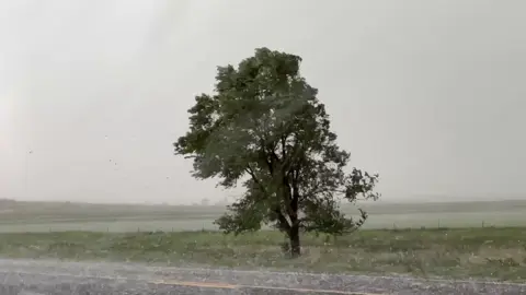 VIDEO: Large hail and damaging wind between Clarendon and Turkey, TX at 5:45pm! Footage provided by TSC’s Blake Brown. His car definitely earned new dents today. We have chasers covering multiple parts of Texas now, check out our live stream on YouTube!