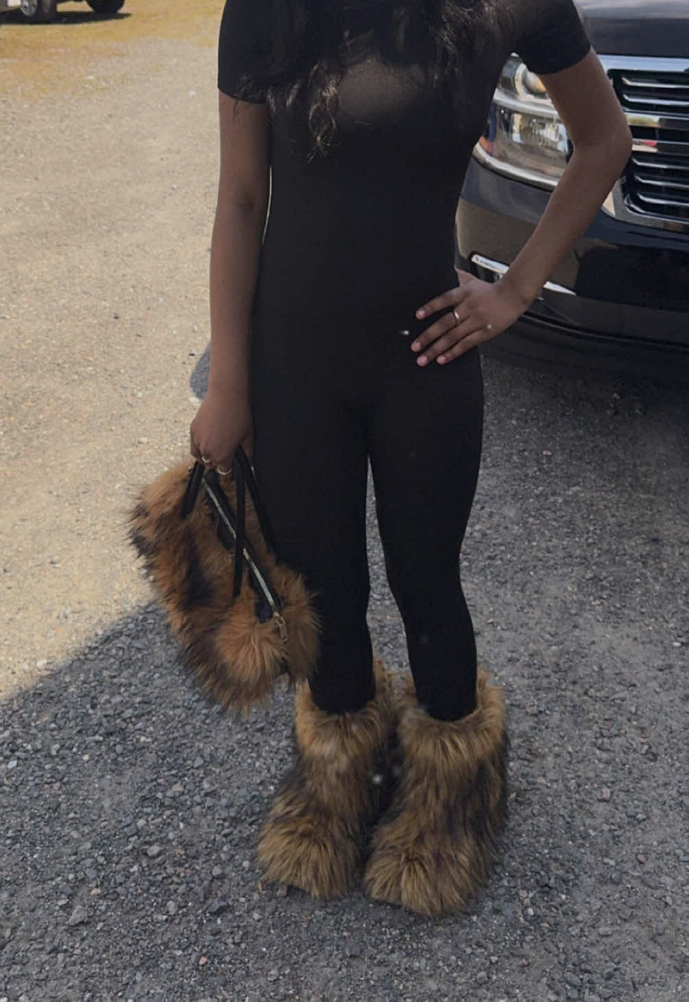 These fur boots and purse was a must for my daughter. Check the link in my showcase and get yours 🤎#fypシ #tik_tok #viral #foryoupage 