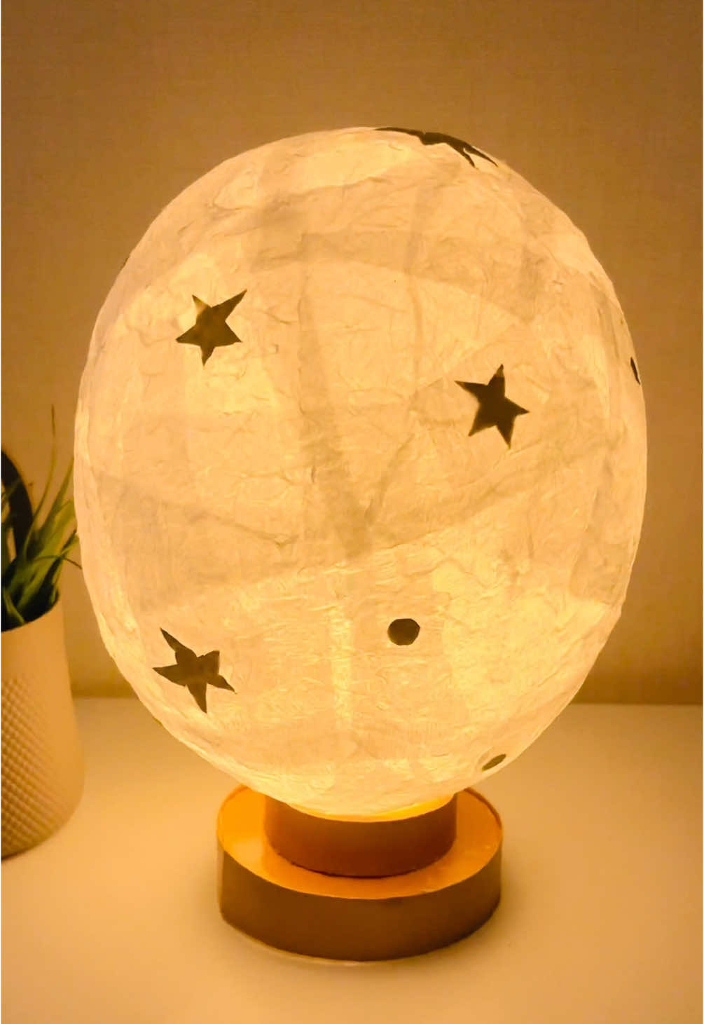 The secret ingredient I’ve been keeping quiet about for a long time. Handmade moon lamp 🪔  #DIYLunarLamp #CreativeProjects #Handmade #DIY Materials:  • Condoms  • Glue  • Toilet paper  • Foil  • Cardboard  • Gold paint  • Garland