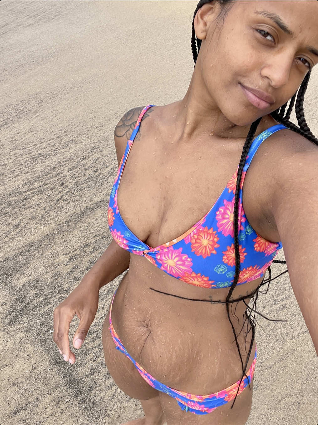 God forbid a woman loves the body they told her to hate. People told her to cover up, to smooth it over, to pretend those lines weren’t there. But she chose to stop hiding. She steps into the frame unfiltered, no retouching, no shame—showing every curve and crease as a badge of her strength. This is more than self-love; it’s a statement. She owns her history, her body, and her power—on her own terms. Bikini | @MOANA BIKINI 